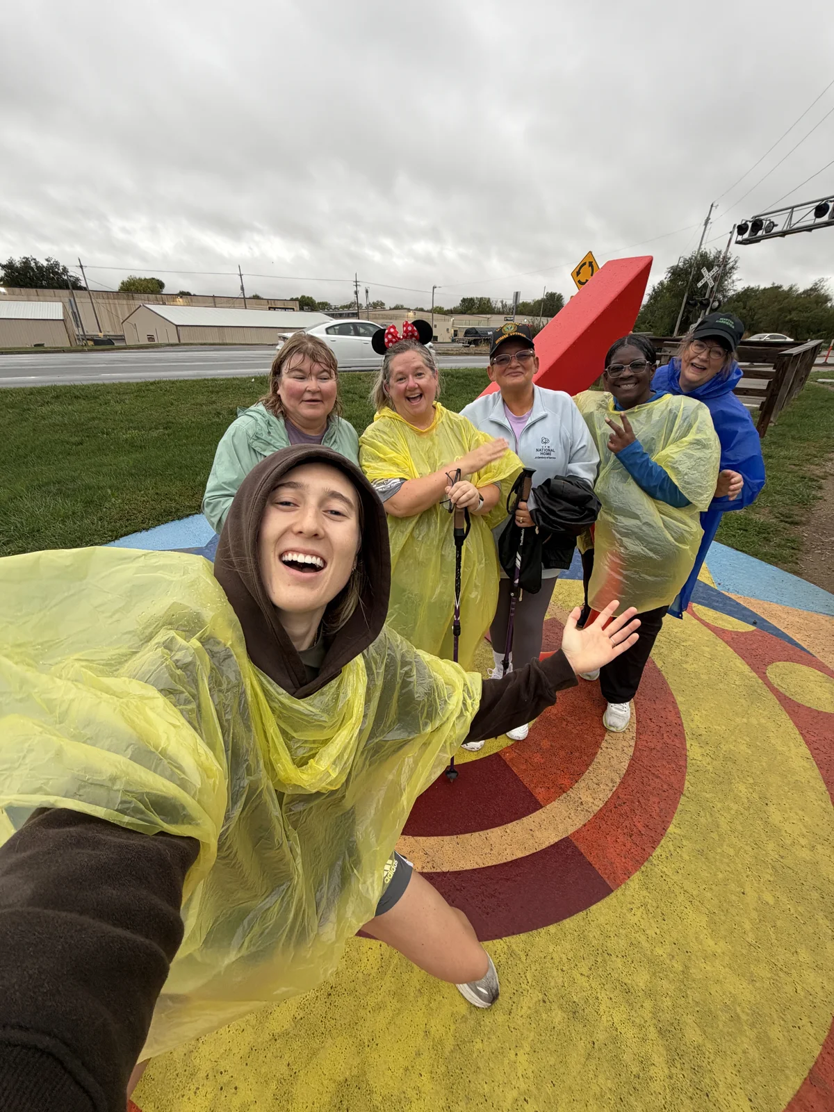 A group from the Formhouse community smiling together outdoors